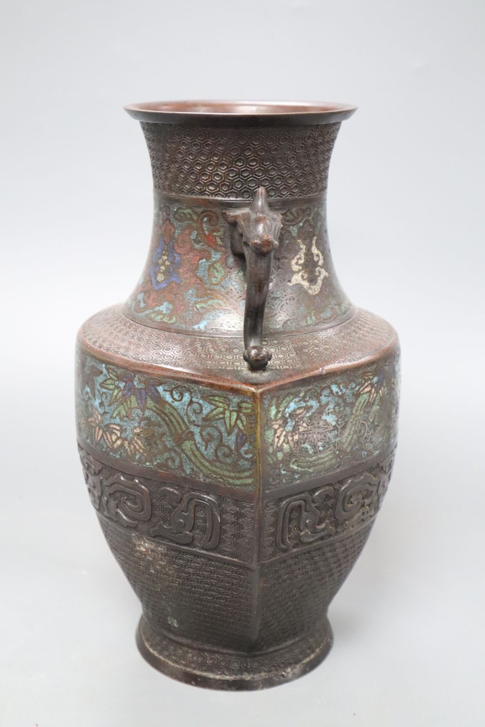 An Oriental bronze and champleve two handled vase, height 28cm